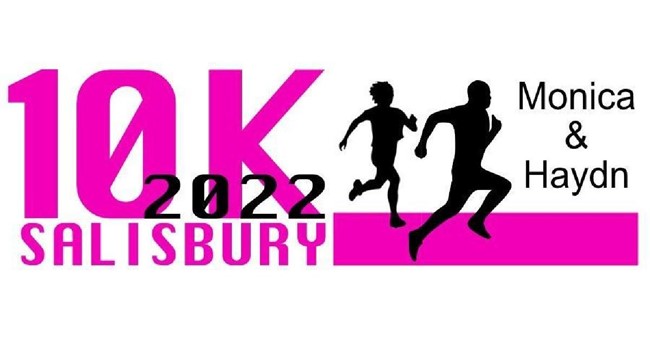 image of of man and woman running in 10k run Salisbury